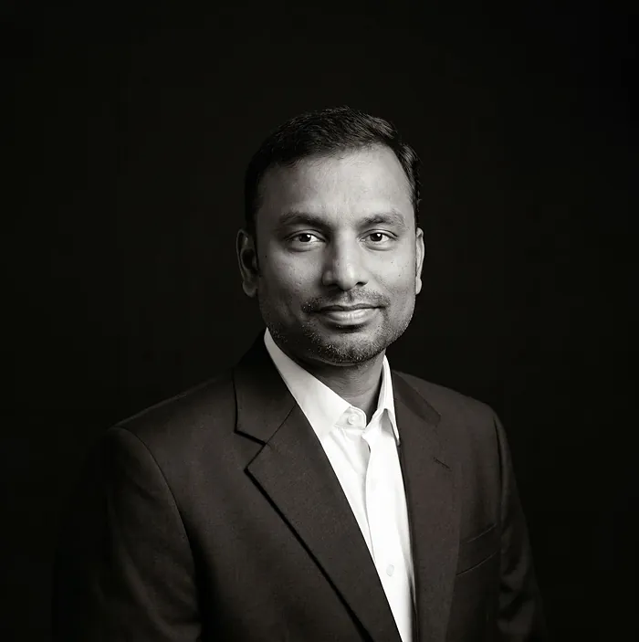 Portrait of Sudheer Harapanahalli, co-founder of Krismar Realty