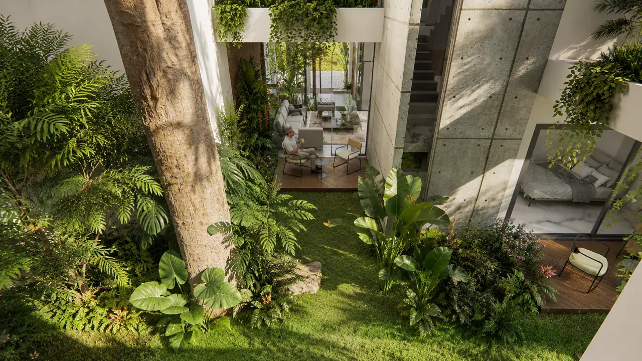 A courtyard garden around a tree at Luxury Villas into the greens, Core Whitefield, Bengaluru
